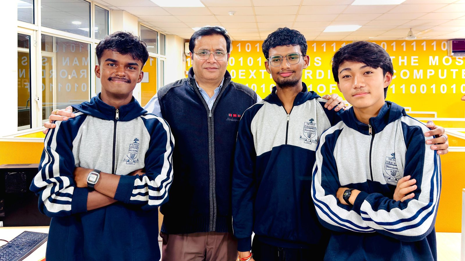 Kushagra Bauddh, C.S. Tyagi Sir, Tanmay Srivastav and Soichi Joko in the school computer lab